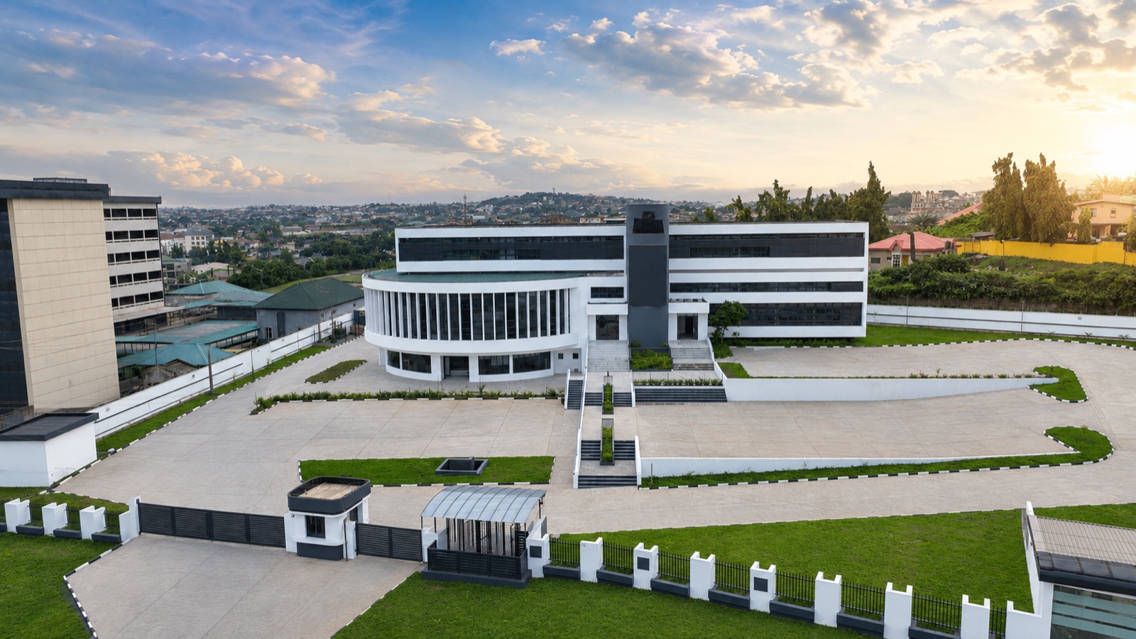 Aerial view of the CapitalSage Global Headquarters and its forecourt at sunset